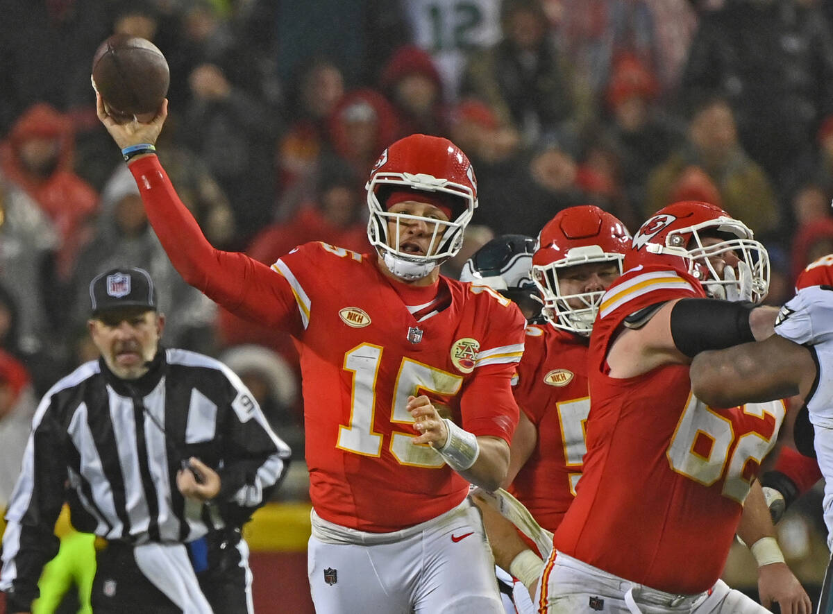 Kansas City Chiefs quarterback Patrick Mahomes (15) throws a pass during an NFL football game a ...