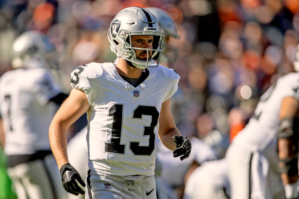 Raiders wide receiver Hunter Renfrow (13) comes on the field during the first half of an NFL ga ...