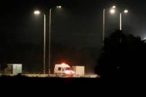 An Israeli ambulance is seen leaving the Kerem Shalom crossing between Israel and Gaza, in Isra ...