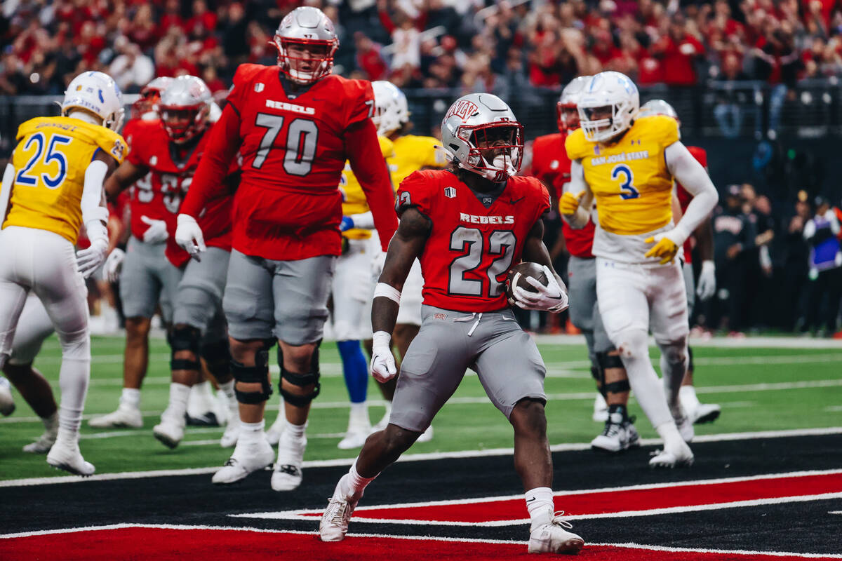 UNLV running back Jai'Den Thomas (22) celebrates a touchdown during a football game against San ...