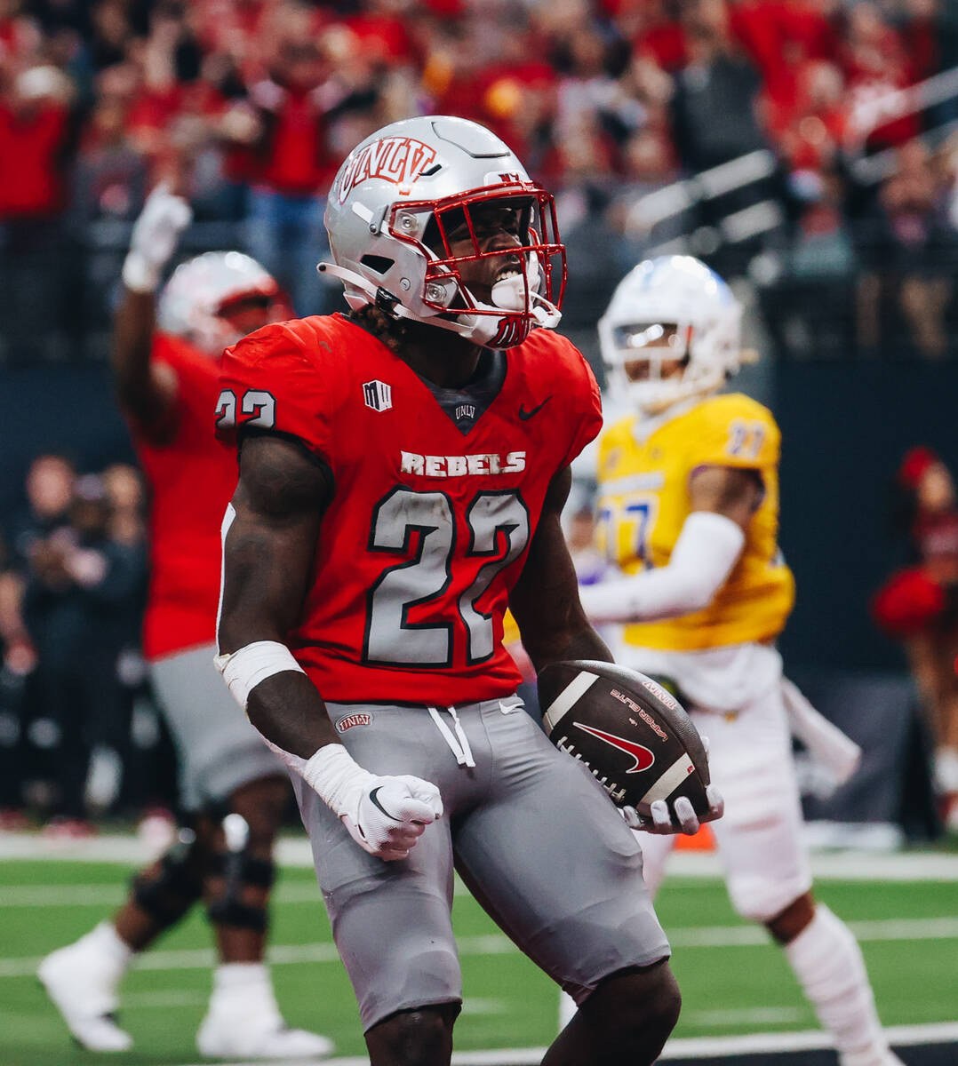 UNLV running back Jai'Den Thomas (22) celebrates a touchdown during a football game against San ...