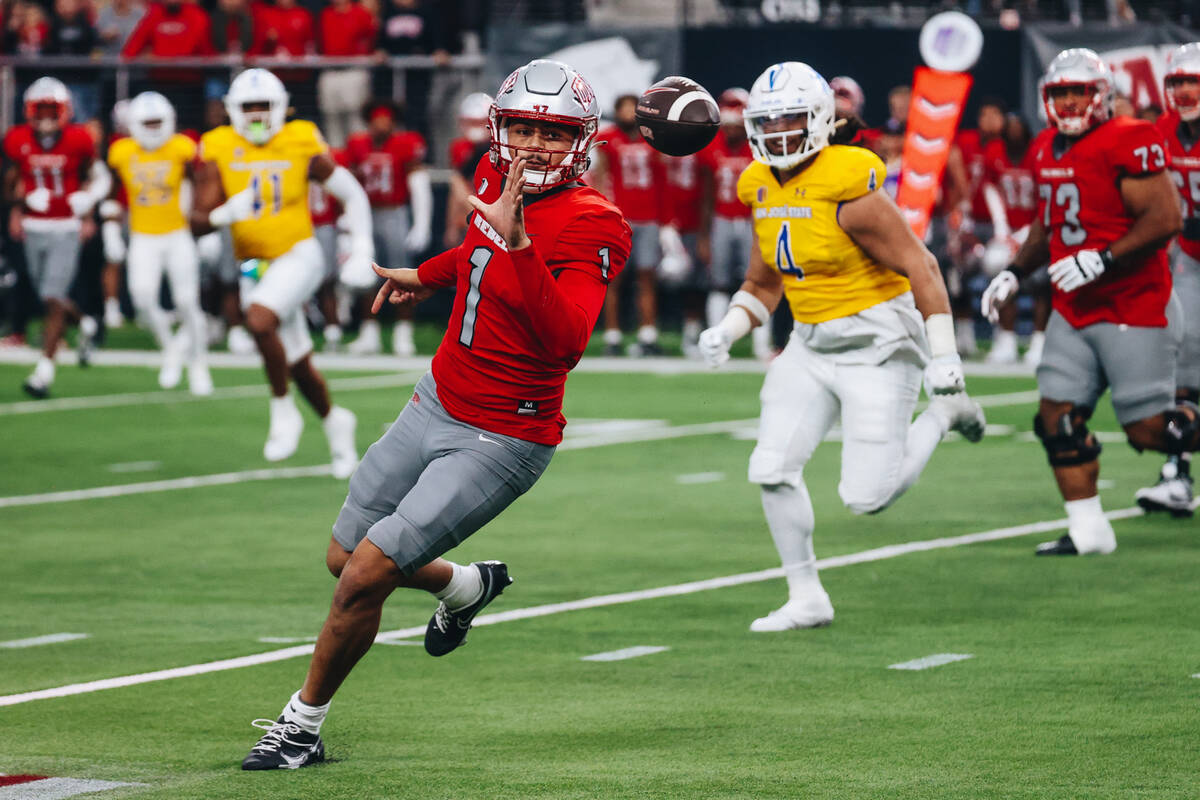UNLV quarterback Jayden Maiava (1) throws the ball to a teammate during a football game against ...