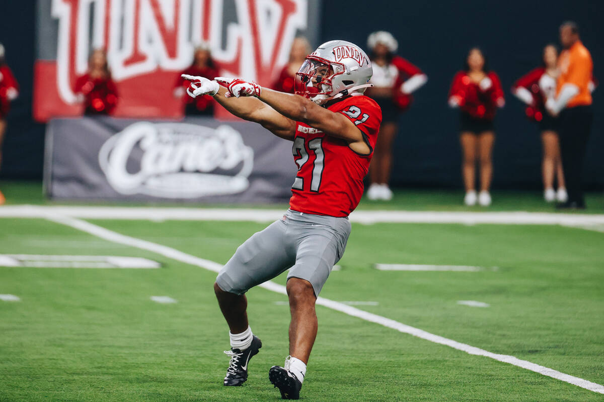 UNLV wide receiver Jacob De Jesus (21) points to San Jose State players during a football game ...
