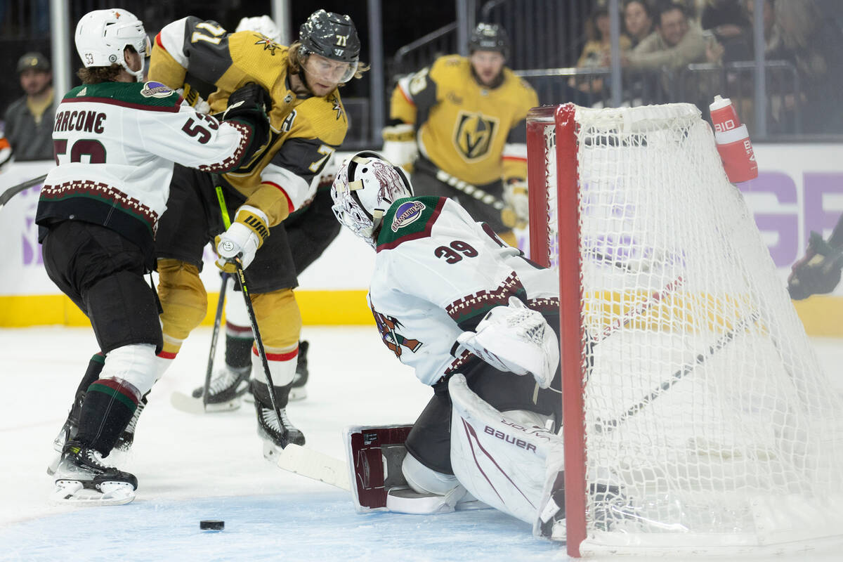 Coyotes goaltender Connor Ingram (39) saves an attempted goal by Golden Knights center William ...
