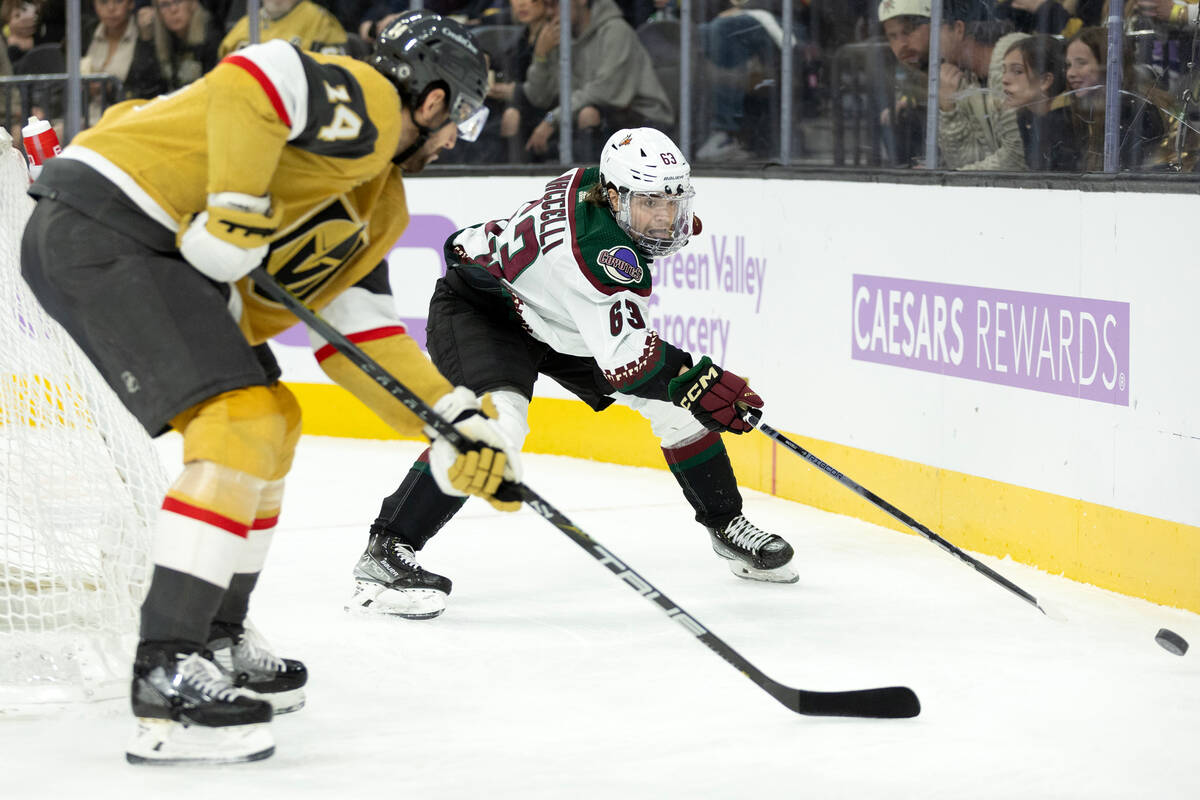 Coyotes left wing Matias Maccelli (63) skates for the puck against Golden Knights defenseman Ni ...