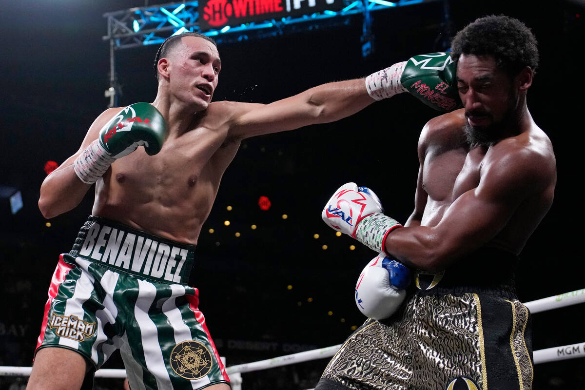 David Benavidez hits Demetrius Andrade during a super middleweight boxing match Saturday, Nov. ...