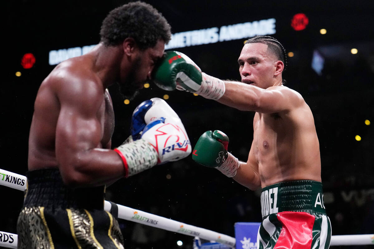 David Benavidez lands a left to Demetrius Andrade during a super middleweight boxing match Satu ...