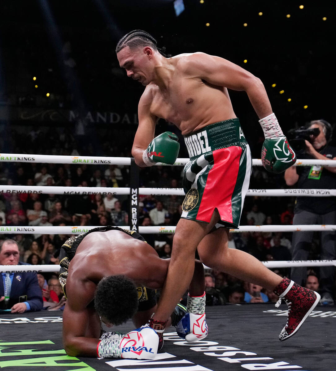 David Benavidez knocks down Demetrius Andrade during a super middleweight boxing match Saturday ...