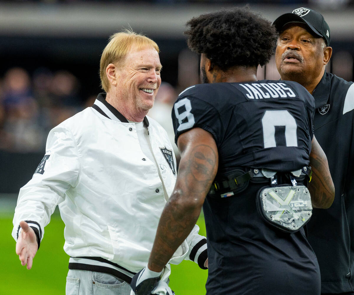 Raiders owner Mark Davis greets running back Josh Jacobs (8) with George Atkinson before the fi ...