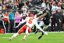 Las Vegas Raiders wide receiver Jakobi Meyers (16) runs against Kansas City Chiefs safety Bryan ...