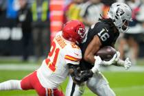 Las Vegas Raiders wide receiver Jakobi Meyers (16) scores on a touchdown reception against Kans ...