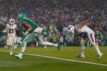 Philadelphia Eagles quarterback Jalen Hurts scores the game winning touchdown against the Buffa ...