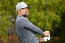 Ryan Moore of Las Vegas watches his tee shot on the 11th hole during the first round of the Shr ...