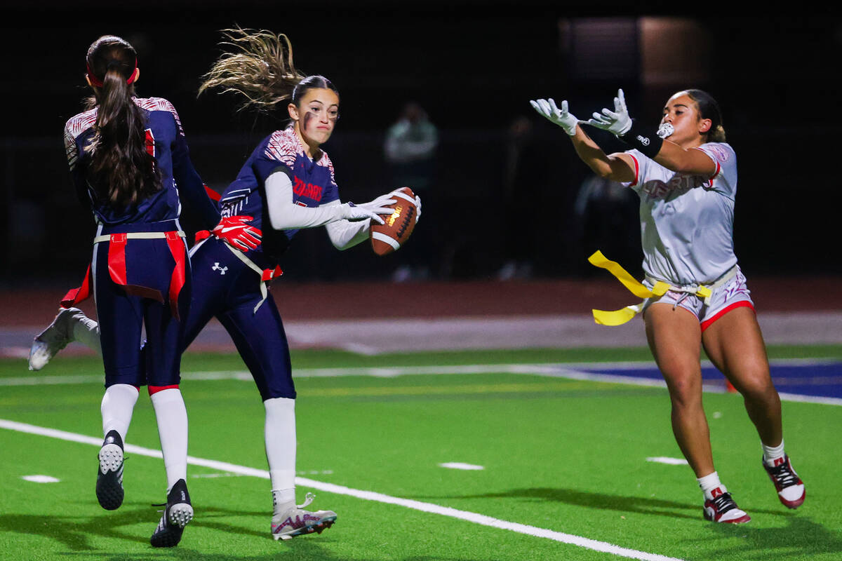 Coronado’s Sienna Siteine (16) catches the ball during a flag football game between Coro ...