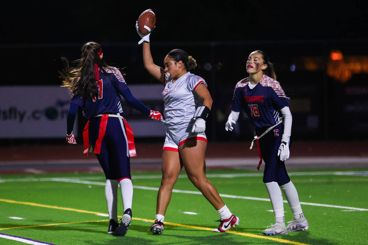 Liberty’s Lolo Westerlund (4) celebrates making a touchdown during a flag football game ...