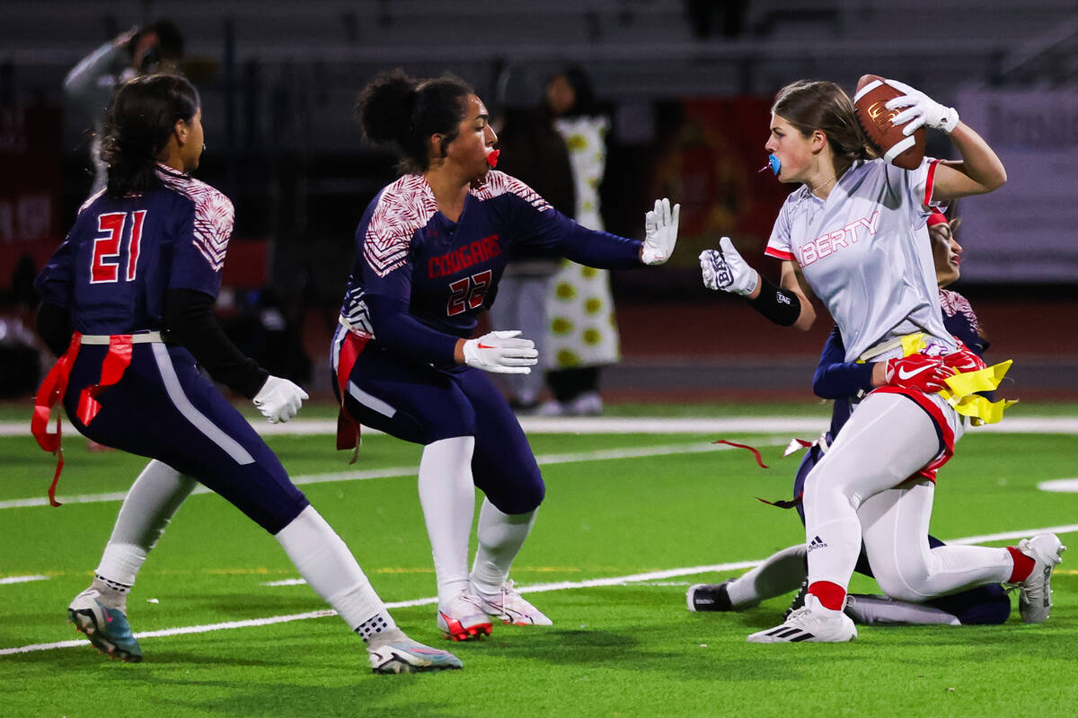Coronado’s Samia Linton-Rivera (22) attempts to stop a Liberty player during a flag foot ...