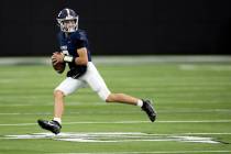 Lake Mead quarterback Jerry Meyer III (3) looks to pass during the first half of a Class 2A hig ...