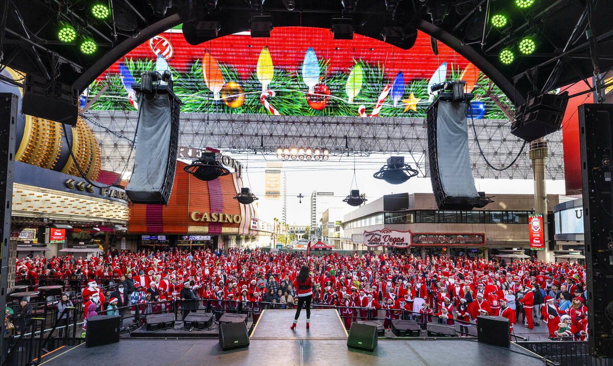 Katie Kelly sings a holiday song during the pre-race entertainment at the Fremont Street Experi ...
