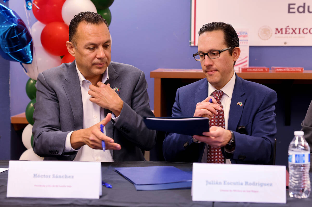 Julian Escutia, Consul of Mexico, right, and Hector Sanchez, president and CEO of Mi Familia Vo ...