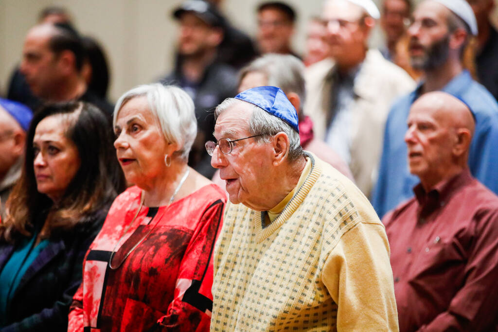 Jewish Nevadans listen to Shye Weinstein, a survivor of the Oct. 7 massacre at the Nova music f ...