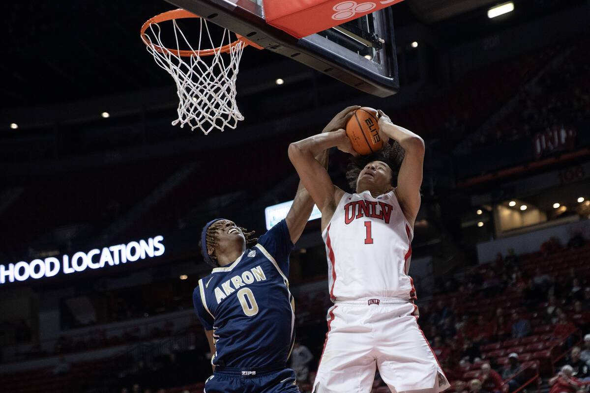 UNLV Rebels forward Jalen Hill (1) shoots against Akron Zips forward Amani Lyles (0) during the ...