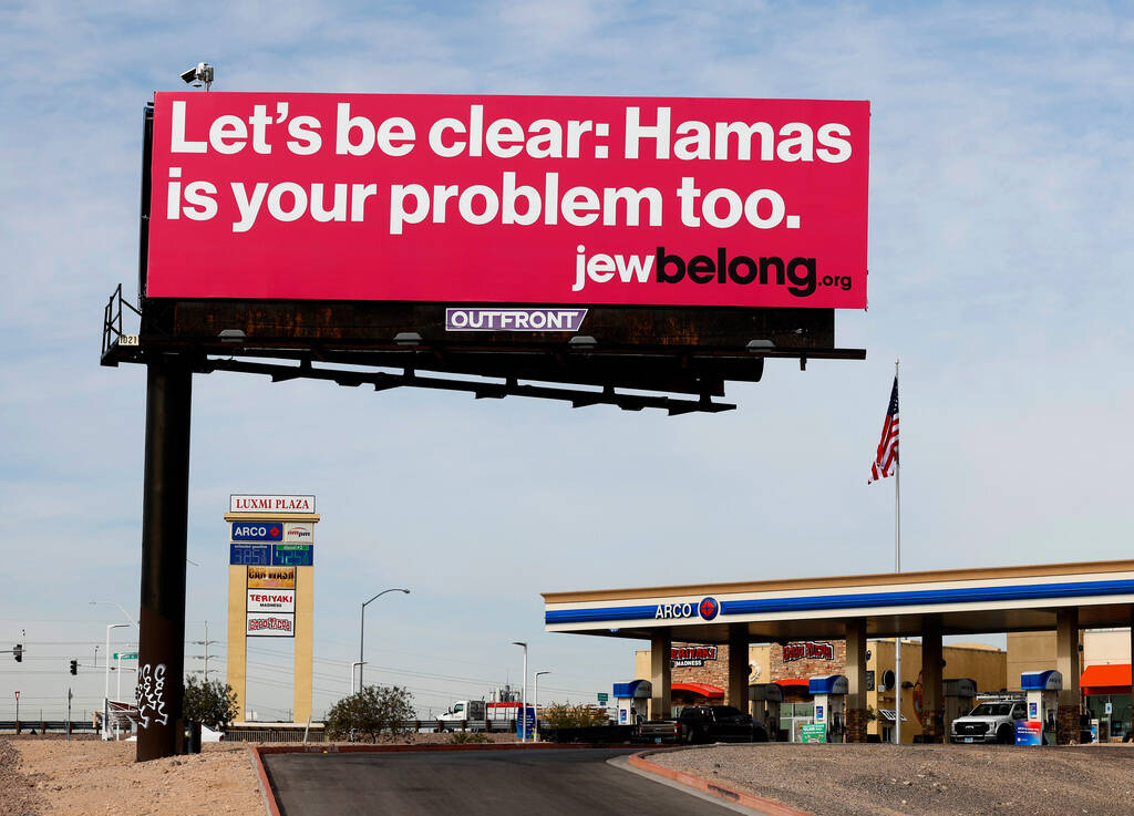 An anti-Hamas billboard sponsored by JewBelong, a nonprofit that fights antisemitism, greets mo ...