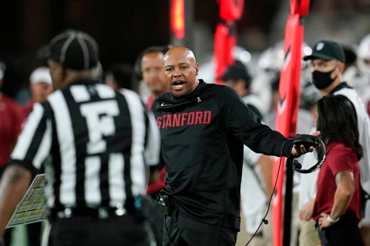 Stanford head coach David Shaw argues with an official during the first half of an NCAA college ...