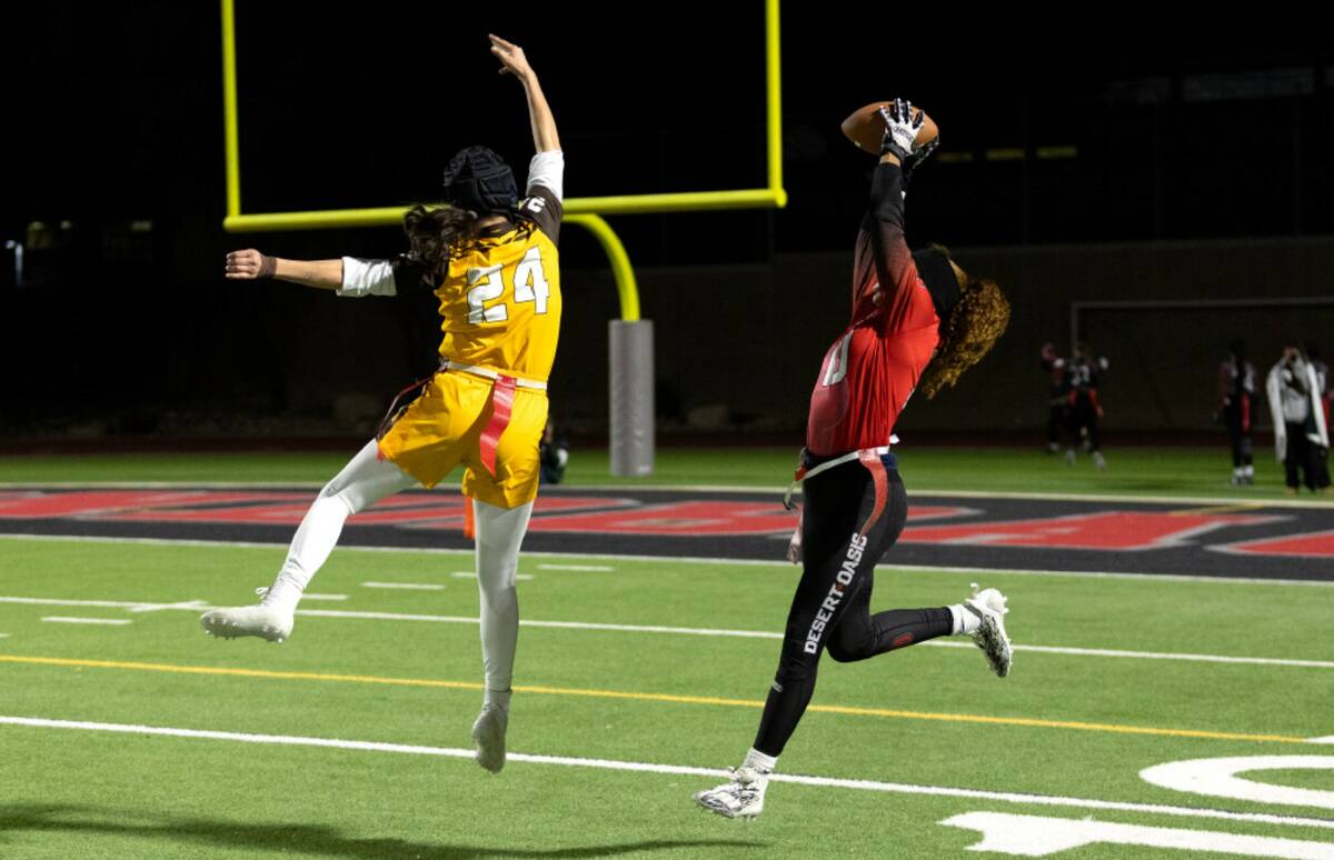 Desert Oasis wide receiver Brooklin Hill (10) catches for a touchdown against Bonanza’s Sequo ...