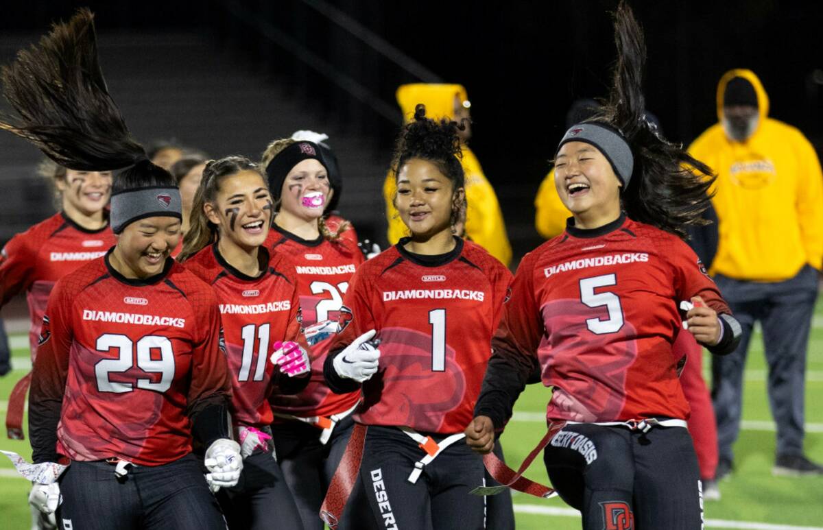 Desert Oasis celebrates their win against Bonanza in a high school flag football game at Desert ...