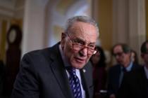 Senate Majority Leader Chuck Schumer, D-N.Y., answers questions from reporters outside the Sena ...