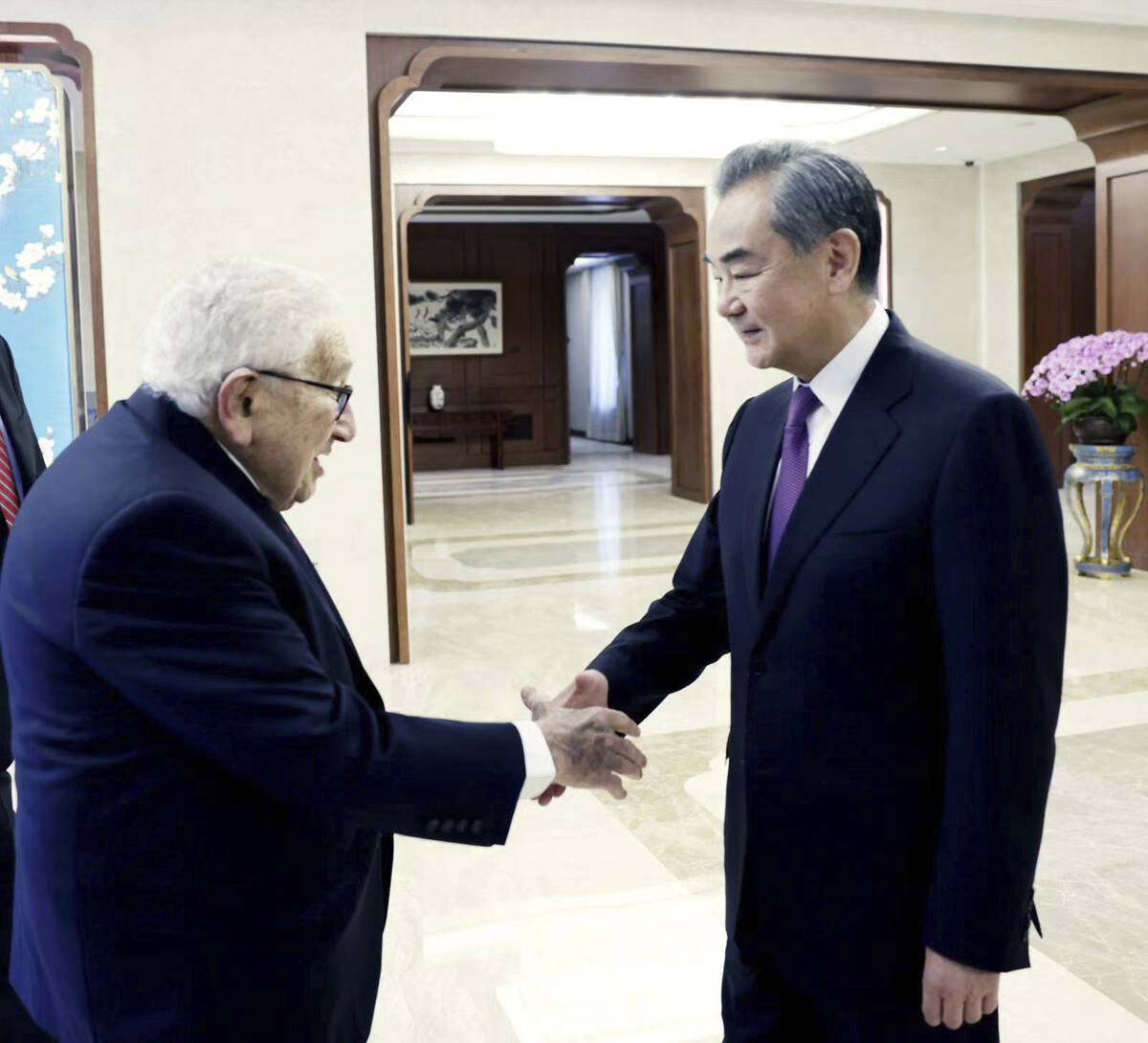 In this photo released by China's Ministry of Foreign Affairs, former Secretary of State Henry ...