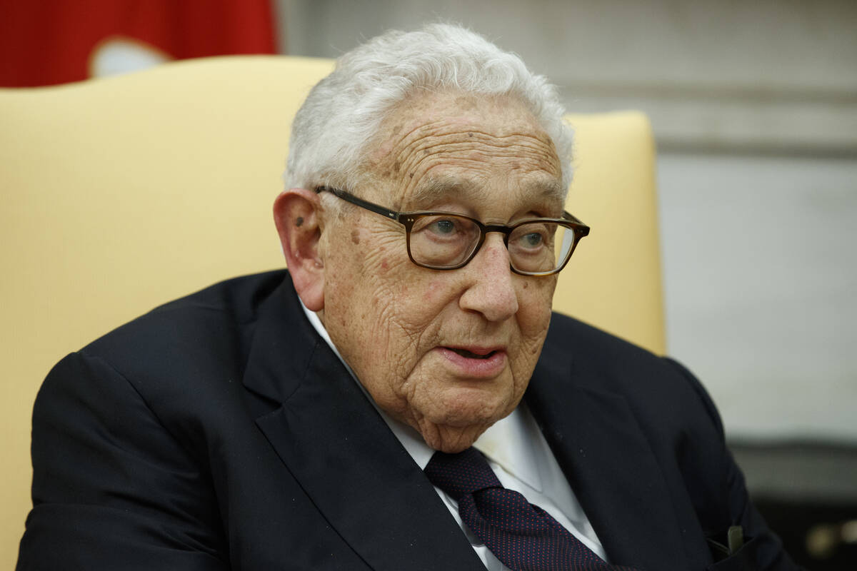 FILE - Former Secretary of State Henry Kissinger speaks during a meeting with President Donald ...