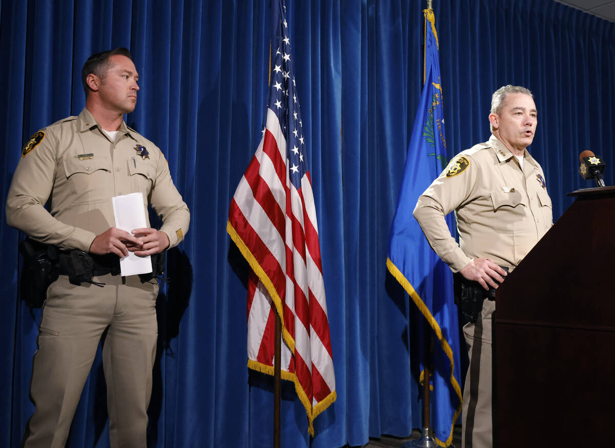 Undersheriff Andrew Walsh, right, speaks about two Nevada State Troopers that were skilled on I ...