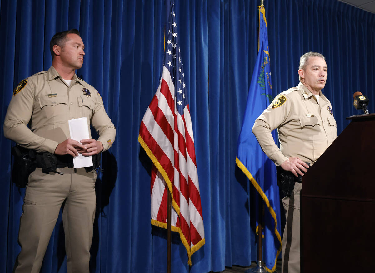 Undersheriff Andrew Walsh, right, speaks about two Nevada State Troopers that were struck and k ...