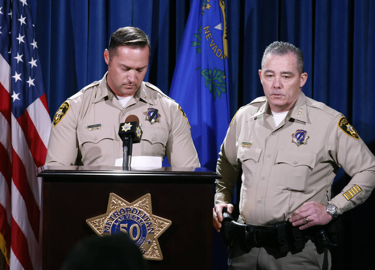 Undersheriff Andrew Walsh, right, speaks about two Nevada State Troopers that were struck and k ...
