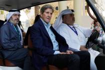 John Kerry, U.S. Special Presidential Envoy for Climate, rides in a cart ahead of the COP28 U.N ...