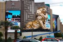 Workers buff the MGM lion statue outside the MGM Grand on Tuesday, April 27, 2021, in Las Vegas ...