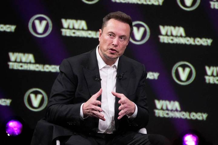 FILE - Elon Musk, who owns X, formerly known as Twitter, Tesla and SpaceX, speaks at the Vivate ...