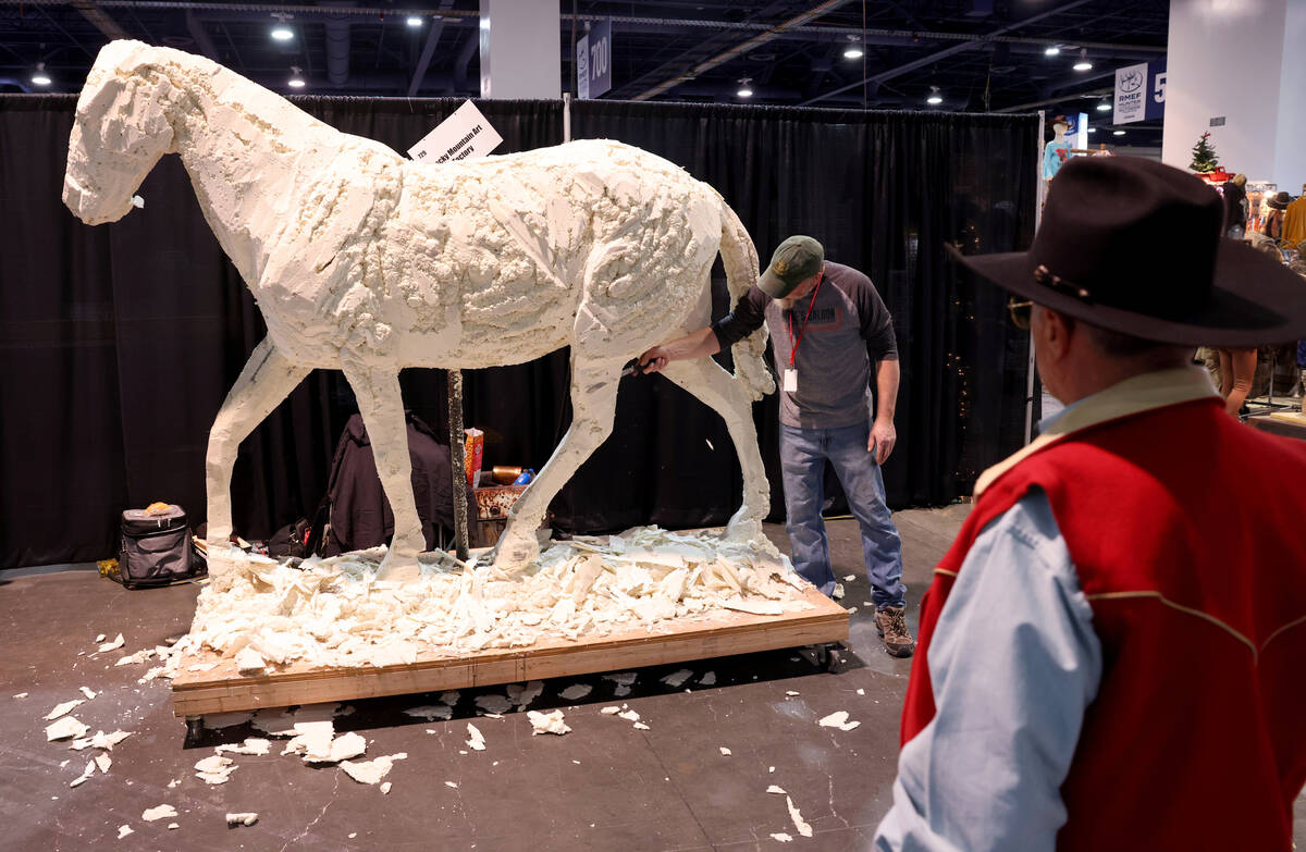 Artist John Pettis works on a commission piece at the Rocky Mountain Art Factory booth during C ...