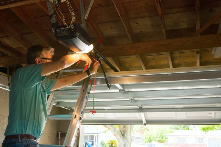 Home centers stock three types of garage door openers: a chain drive like this one (starting at ...