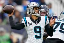 Carolina Panthers quarterback Bryce Young (9) looks to throw a pass during the second half of a ...