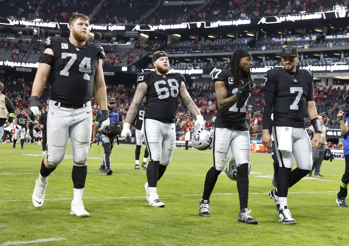 Raiders offensive tackle Kolton Miller (74) Raiders center Andre James (68) Raiders wide receiv ...