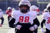 UNLV football walk-on defensive lineman Tatuo Martinson (98) works out during practice at Rebel ...