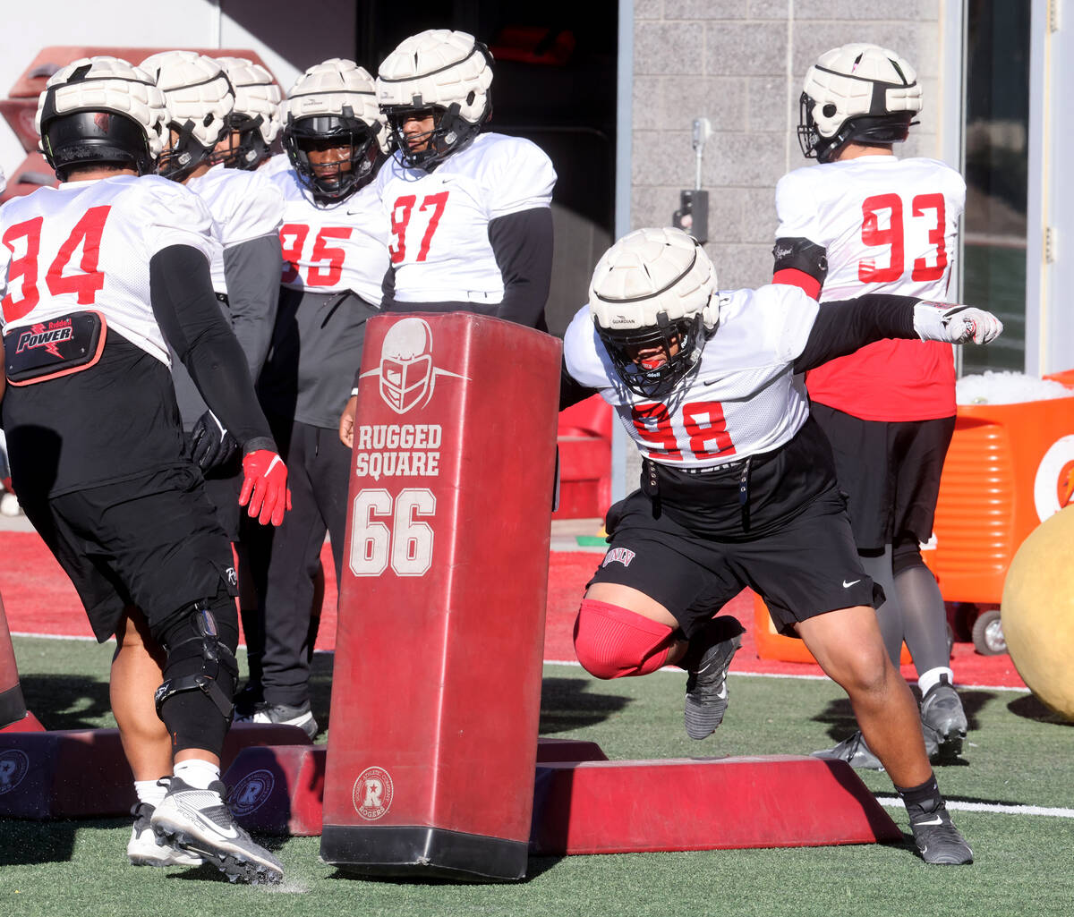 UNLV football walk-on defensive lineman Tatuo Martinson (98) works out during practice at Rebel ...