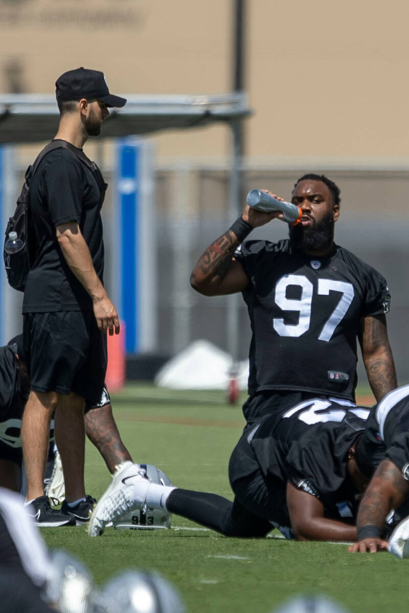 Raiders defensive tackle Nesta Jade Silvera (97) takes a water break during the team’s m ...