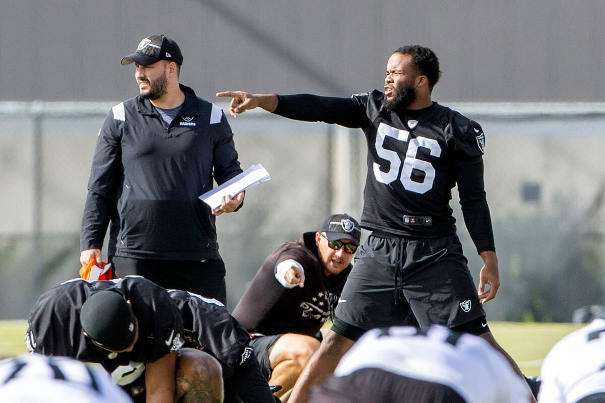 Raiders linebacker Amari Burney (56) points out something to an assistant during practice at th ...
