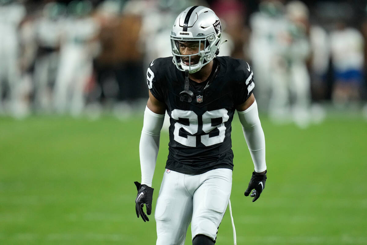 Las Vegas Raiders safety Chris Smith II (29) warms up before an NFL football game against the N ...