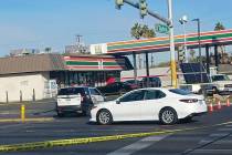 Police investigate a fatal crash at Desert Inn Road and Eastern Avenue in east Las Vegas on Sat ...