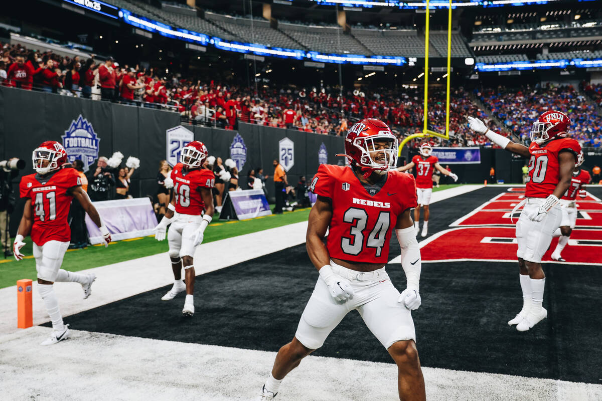 UNLV players get amped up during the Mountain West championship game at Allegiant Stadium on Sa ...