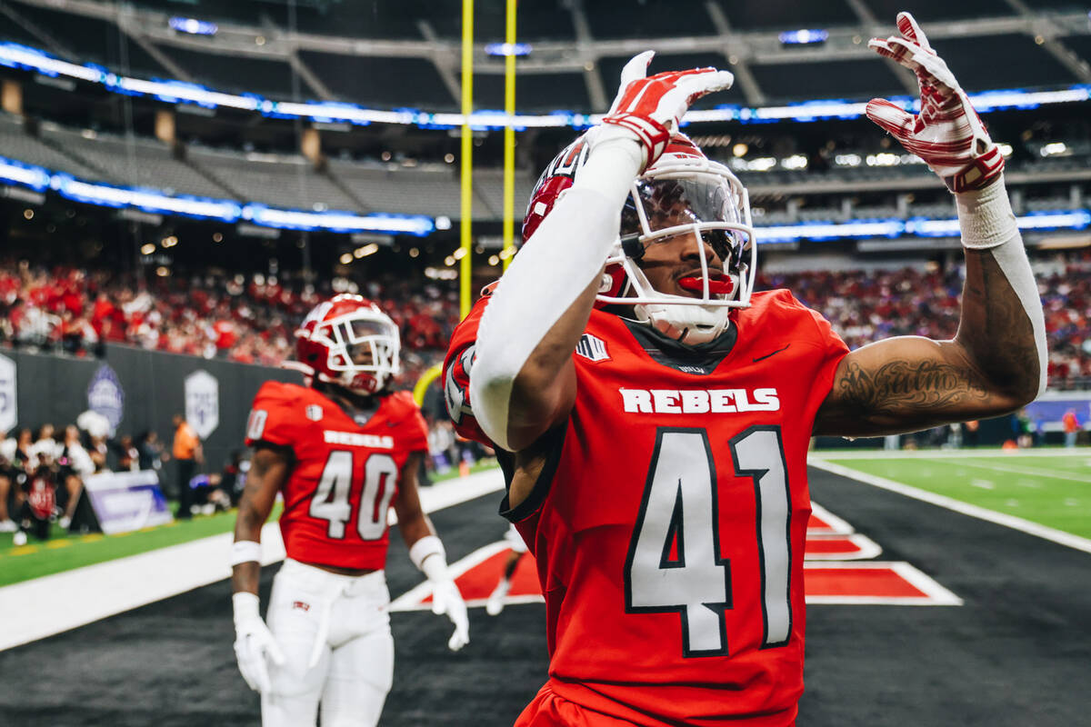 UNLV defensive back Rashod Tanner (41) pumps up the crowd during the Mountain West championship ...